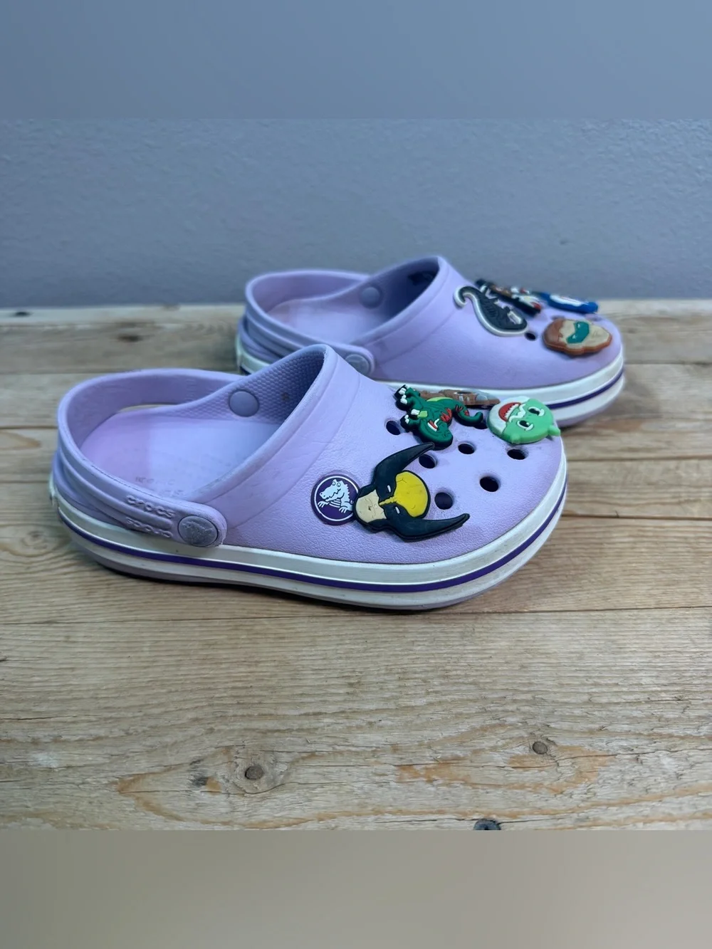 CROCS Kids Light Purple Clogs with Character Jibbitz